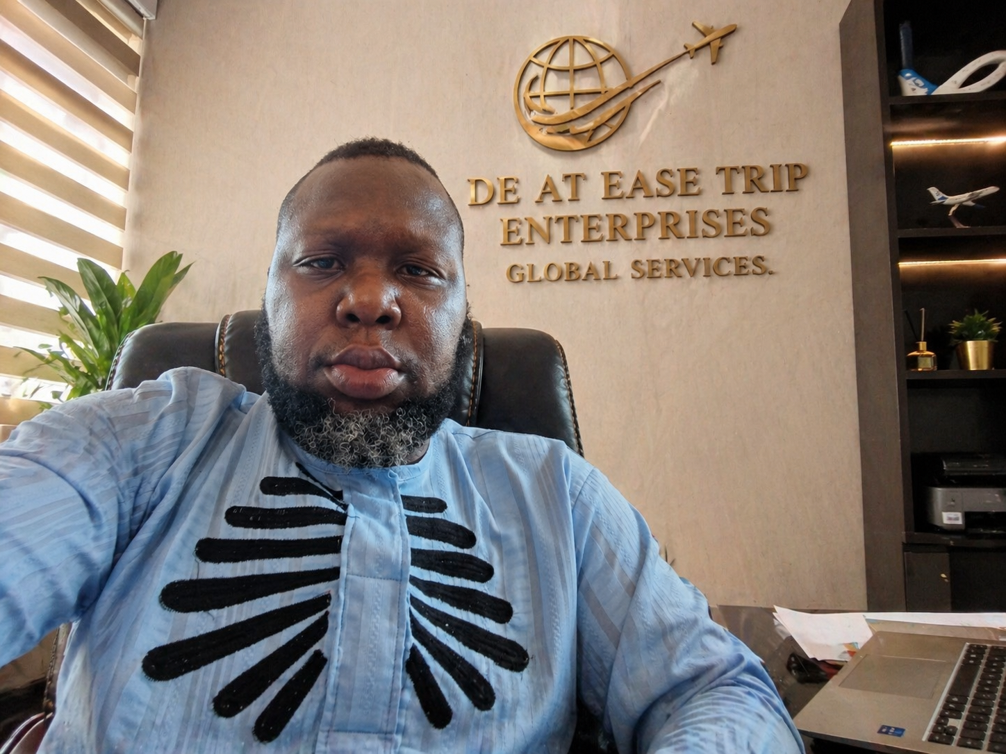 Chief Ikedinobi Chukwudi A., founder of De At Ease Trip Global Services, in his office in Anambra State